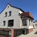 Freistehendes Einfamilienhaus mit Garage und Garten in familienfreundlicher Lage