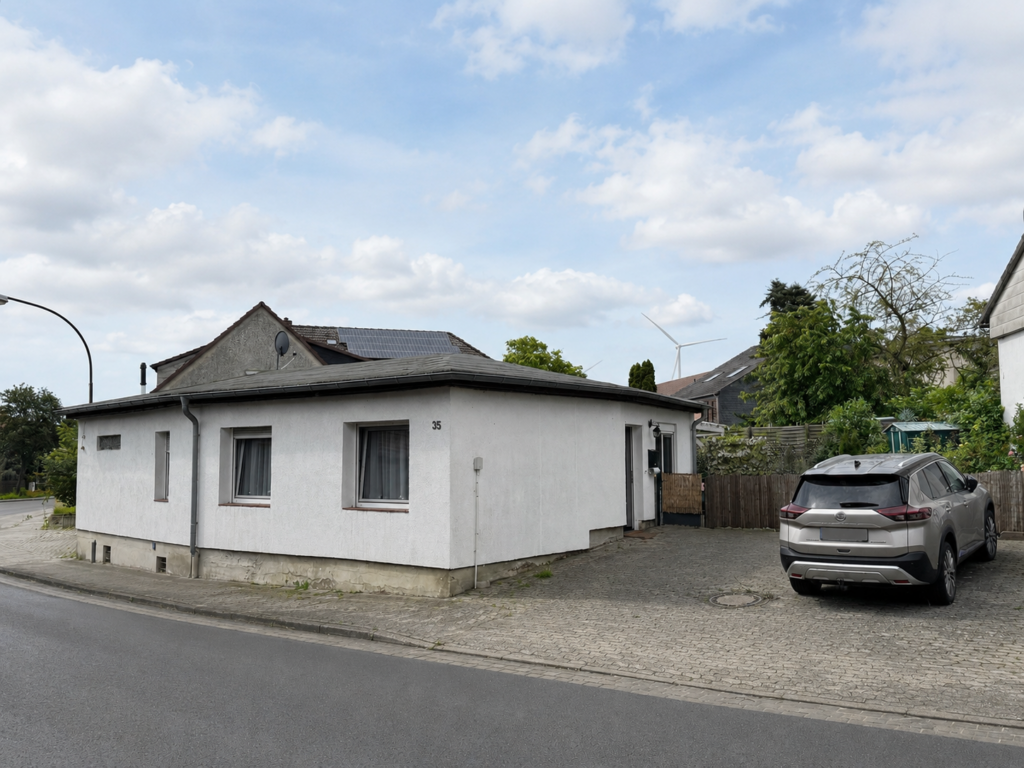 Bungalow mit Garten, überdachter Terrasse und moderner Ausstattung Bungalow mit Garten, überdachter Terrasse und moderner Ausstattung