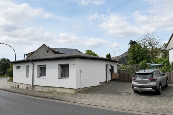 Bungalow mit Garten, überdachter Terrasse und moderner Ausstattung Bungalow mit Garten, überdachter Terrasse und moderner Ausstattung