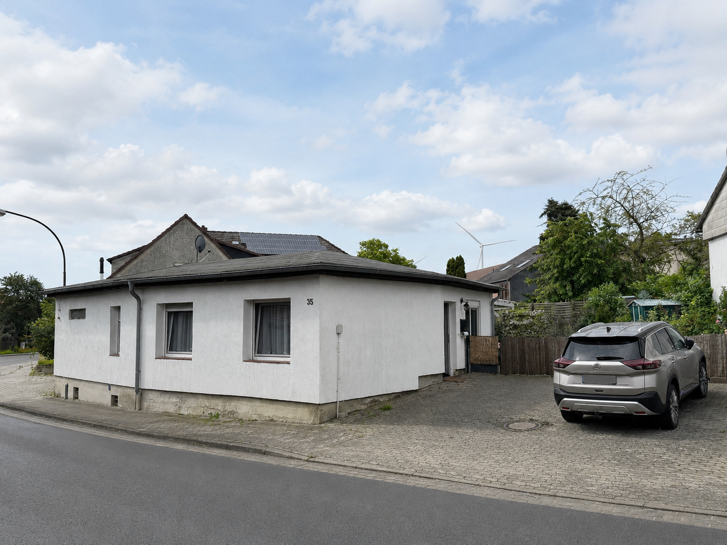 Bungalow mit Garten, überdachter Terrasse und moderner Ausstattung Bungalow mit Garten, überdachter Terrasse und moderner Ausstattung